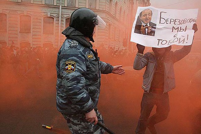 Dispersing of demonstrators, teenager is carrying sign Berezovsky, we are with you!. Organizers of the rally have considered that this slogan was a pr
