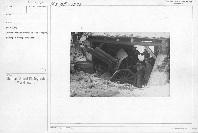 File:German winter watch in the Vosges. Firing a heavy howitzer - NARA - 17390244.jpg