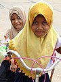 Girls on Bicycle - Cham Muslim Village - Tonle Bet Commune - Kampong Cham - Cambodia (48345361661).jpg