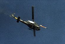HH-1K testing a Sidewinder Missile at China Lake, CA HH-1K firing Sidewinder at China Lake 1971.jpeg