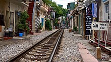 Train tracks in the middle of a street in Hanoi, Vietnam
