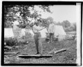 Henry Ford chopping wood LOC npcc.04715.tif