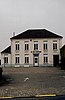 Gemeentehuis van Humbeek, gemeenteschool en woning voor de onderwijzer