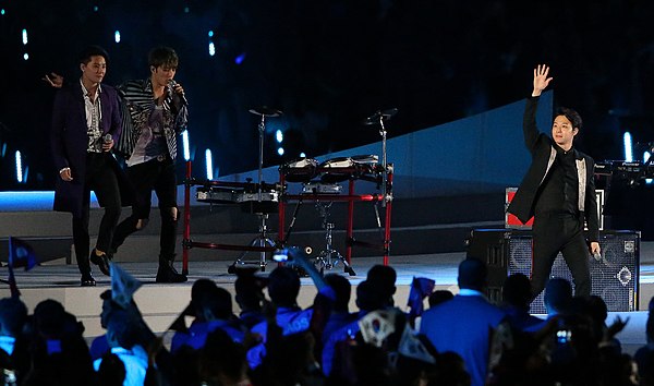 2014 Asian Games opening ceremony, JYJ performing, "Only One". Left to right: Junsu, Jaejoong, Yoochun.