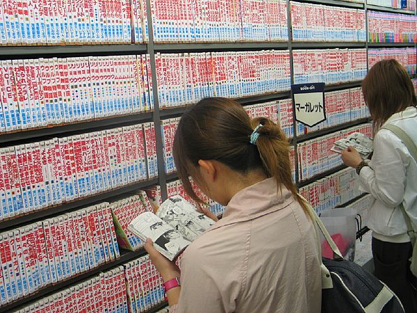 Shelves of collected volumes of shōjo manga under the Margaret Comics imprint at a bookstore in Tokyo in 2004