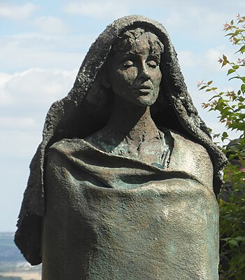 Karlheinz Oswald, Hildegard of Bingen, 1998, bronze, in front of Eibingen Abbey