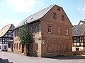 House in corner and rear building