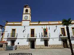 In front of a monument in La Cumbre, Cáceres