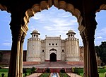 Look at a Mughal-style fort through some columns