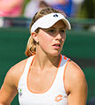 Lucy Brown competing in the first round of the 2015 Wimbledon Qualifying Tournament at the Bank of England Sports Grounds in Roehampton, England. The winners of three rounds of competition qualify for the main draw of Wimbledon the following week.