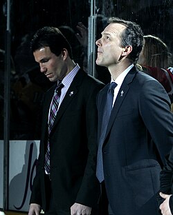 Cooper (oikealla) Luke Richardsonin kanssa vuoden 2013 NHL:n tähdistöottelussa