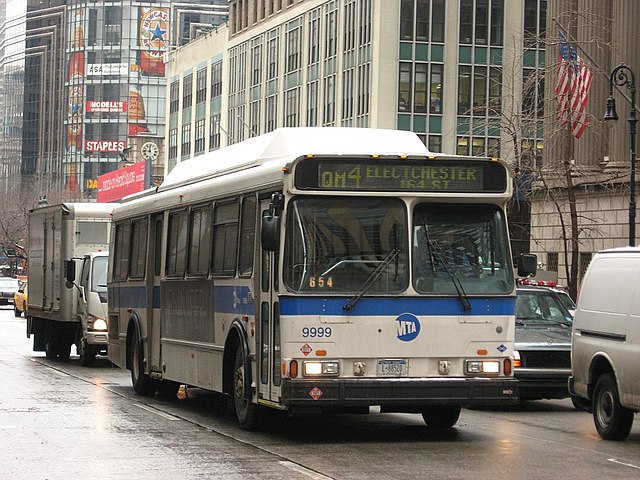 A former Queens Surface Orion V CNG bus on QM4 service in Manhattan.