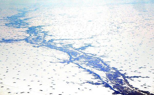 The Minnesota River Valley and tributaries as seen from the air at Redwood Falls, Minnesota. The river occupies only a small portion of the wide valle