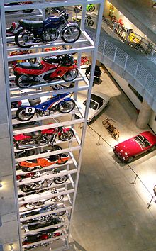 Motorcycle stack display at the Barber Vintage Motorsports Museum. Motorcycle stack display in Barber Vintage Motorsports Museum.jpg