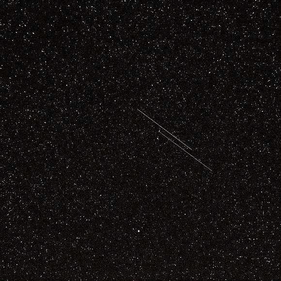 NOSS 3-3 duo passing by Polaris (bright star at the bottom). Movement in this 12.3 seconds exposure is from upper-left to bottom-right; the A object is leading. 6 February 2016, 18:52 (UT+2), Kyiv