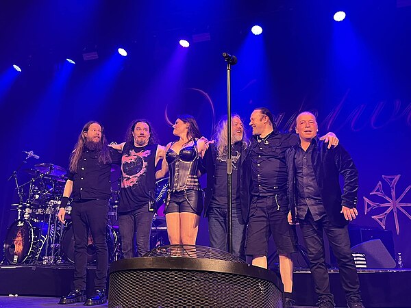 Nightwish after a performance in Toronto in May 2022; (L–R): Jukka Koskinen, Tuomas Holopainen, Floor Jansen, Troy Donockley, Kai Hahto, Emppu Vuorine