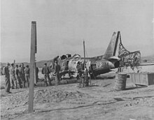 Wreckage of F-86A Sabre (FU-334 / 49-1334) after being bombed on 17 June 1951 North korean bombing cropped1.jpg