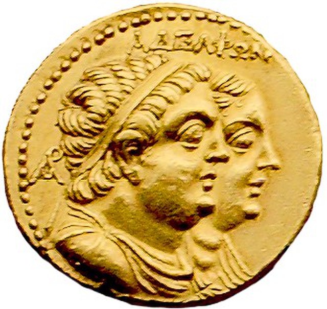 Head of Ptolemy II Philadelphus with Arsinoe II behind. The Greek inscription ΑΔΕΛΦΩΝ means "coin of the siblings".