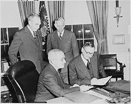 Secretary of Defense George C. Marshall with President Truman, Secretary of State Dean Acheson, and Prime Minister of France Rene Pleven during Pleven visit to Washington D.C., at the White House on January 29, 1951.