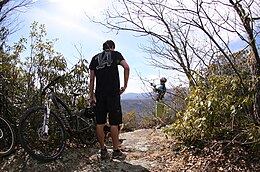 View from Black Mountain Trail in Pisgah National Forest. Mountain bikers take a break near the summit of Black Mountain. Pisgah National Forest (view from trail).jpg