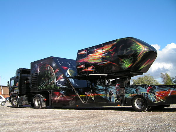 A typical motion ride simulator mounted on a trailer to make it mobile.