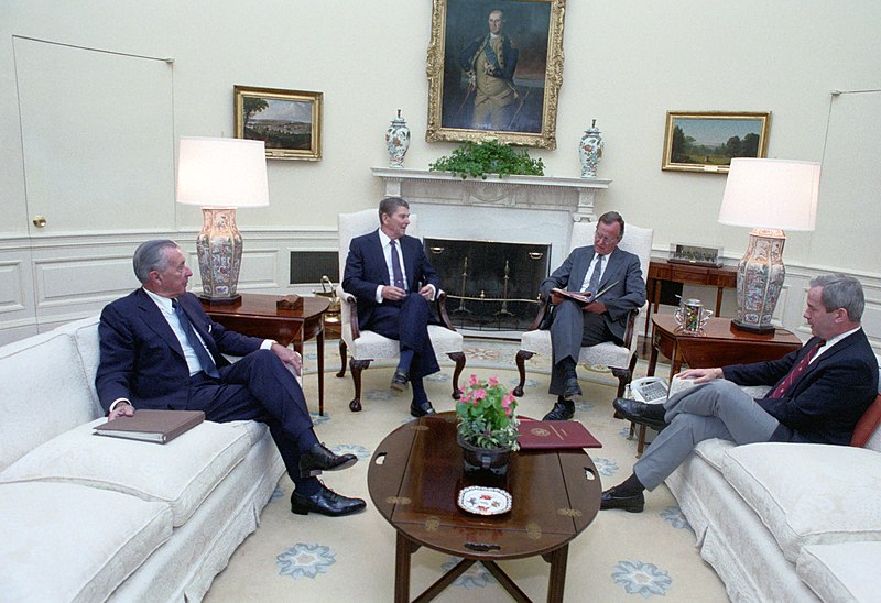 File:President Ronald Reagan during a National Security Briefing with George H. W. Bush, Robert McFarlane, and Donald Regan in the Oval Office.jpg