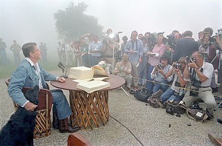President Ronald Reagan signs the Economic Recovery Tax Act of 1981 at his California ranch.