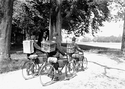 A cyclist's patrol with homing pigeons on its back