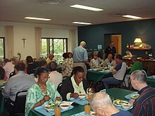 A meal in the refectory of the Retreat House silent dining room Retreat House refectory at Holy Spirit Monastery.jpg