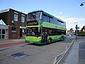 Southern Vectis 1107 Shippards Chine (HW58 ARZ), a Scania OmniCity, in South Street, Newport, Isle of Wight operating a Bestival shuttle service directly from Newport to the Bestival 2010 site at Robin Hill.