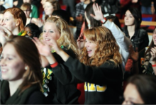 Student Volunteers Cheering at the Count Me In Global Broadcast.png