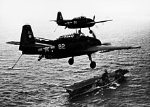 Avengers belonging to Torpedo Squadron 2 (VT-2) overflying Hornet, mid-1944 TBF-1 Avengers of VT-2 over USS Hornet (CV-12) in 1944.jpg