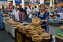 Tajik woman selling bread.jpg