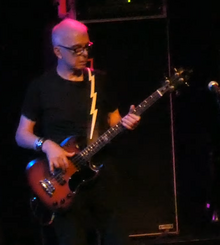 Visconti playing bass with Holy Holy in 2017 Tony Visconti Holy Holy.png
