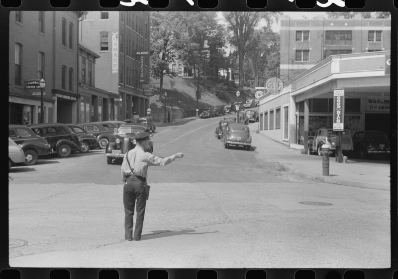 File:Traffic cop in Brattleboro, Vermont, by Jack Delano, United States Office of War Information, August 1941, from the Library of Congress - master-pnp-fsa-8a36000-8a36400-8a36412a.tif