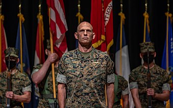 Lt. Gen. Kevin M. Iiams stands at attention during the TECOM change of command ceremony on Aug. 2, 2021.