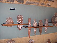 In pre-literate societies, the distinctive shape of amphora served some of the functions of a label, communicating information about region of origin, the name of the producer and may have carried product quality claims Turkey.Bodrum044.jpg