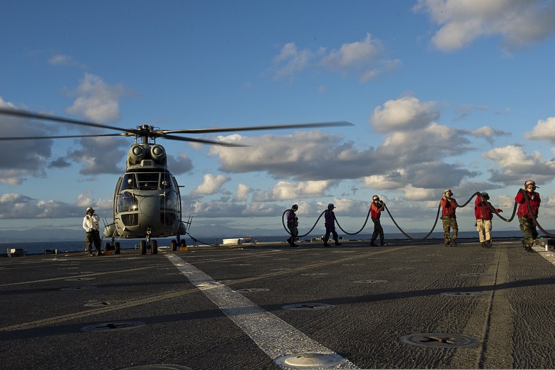 File:U.S. Sailors stow fuel hose after a simulated refueling of a French Army SA 380 Puma helicopter after landing aboard the amphibious dock landing ship USS Pearl Harbor (LSD 52) June 28, 2013, while underway 130628-N-WD757-186.jpg