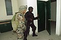 A U.S. Marine and a Haitian policeman in April 2004.