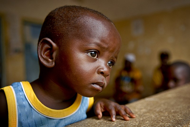 File:US Navy 081007-N-8977L-092 A boy waits with his mother for his malaria lab results at a dispensary in Tanga, Tanzania during a medical civic action project.jpg