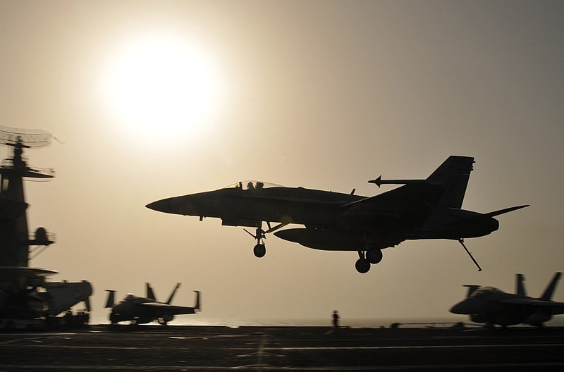 File:US Navy 100711-N-6362C-242 A Hornet lands aboard USS Harry S. Truman.jpg