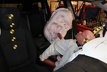 Front-center airbag of a Chevrolet Traverse deployed in a static out-of-position test: The purpose of the test was to find out how this airbag affects a 3-year-old child who is out of his seat and in the direct reach of the airbag. V08232P024.jpg