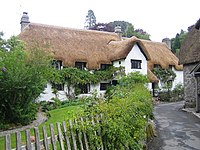 Wrayland Manor. The archetypal chocolate box Devon thatched house in the hamlet of Wrayland. Several old chocolate boxes and postcards depict this particular building, calling it variously the Hall House and an "Old Cottage". Wrayland Manor - geograph.org.uk - 437386.jpg