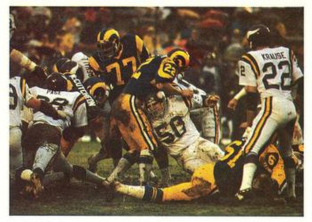 The Vikings' famed Purple People Eaters defensive line stopping a Rams rush in the 1977 NFC Divisional Playoff game.