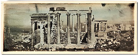 Joseph-Philibert Girault de Prangey: 62. Athènes. Temple de Minerve Poliade. Daguerreotype, 1842. The first photograph of the Erechtheion, the war damage is still evident as well as the opus Elgin in the Maiden Porch.