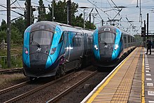 Trains on the TransPennine Express, which serves Manchester Airport 802201 and 802218 at Northallerton.jpg