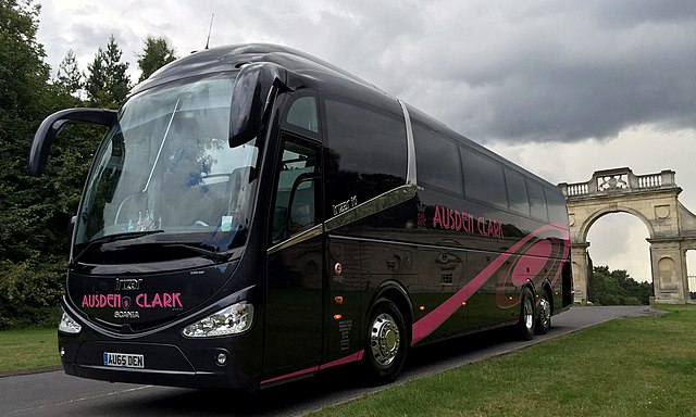 Ausden Clark Executive Scania Irizar i6 coach in black and pink livery
