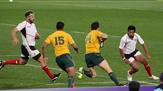 Beale (15) playing for Australia at the 2011 Rugby World Cup. Australia vs USA 2011 RWC (3).jpg