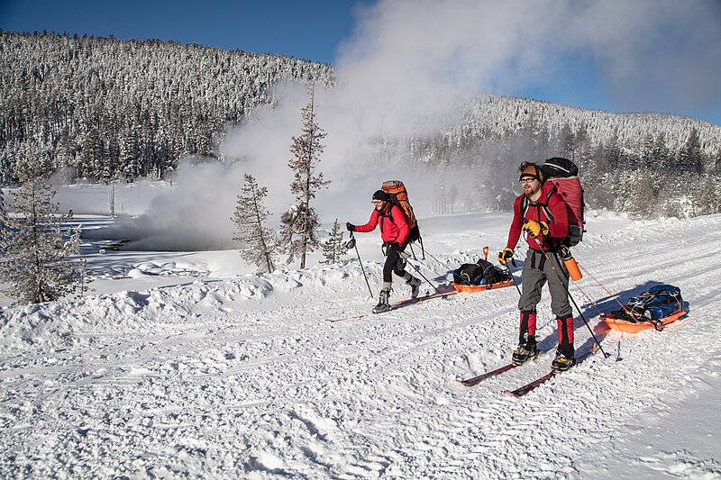 File:Backcountry campers skiing on road by Bijah Spring (756976fb-5edf-4d91-b1bf-7eb2ab49637a).jpg
