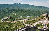 China's first emperor, Qin Shi Huang, is famed for having united the Warring States' walls to form the Great Wall of China. Most of the present structure, however, dates to the Ming dynasty.